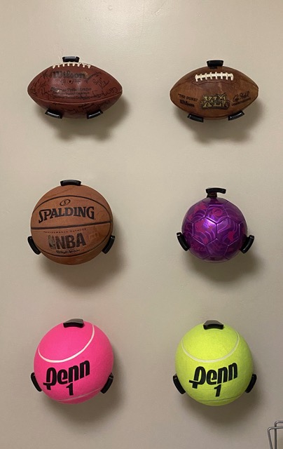 Balls on the Walls!  These handy holders keep balls organized, clean and off the floor!