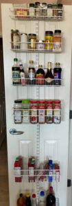 Small pantry?  Make use of the door!  This ELFA door mounted system from The Container Store is perfect for all those bottles and spices that want to tip over on your shelves.